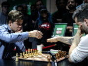 Впервые в истории шахмат: Непомнящий и Карлсен разделили первое место на чемпионате мира по блицу